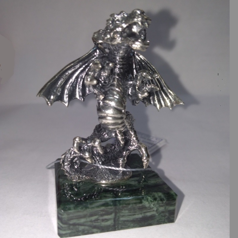 серебряная статуэтка дракон